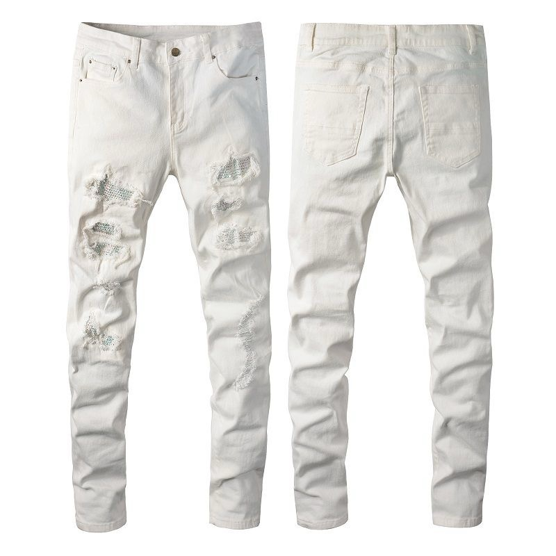 AMIRI WHITE RIPPED JEANS