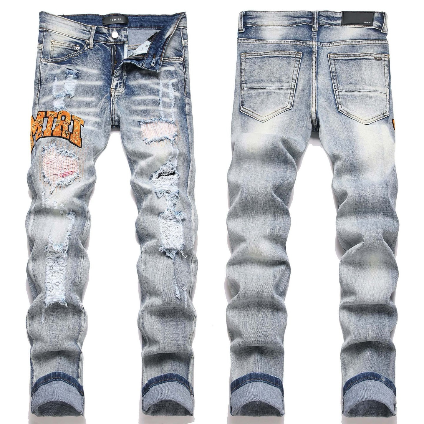 AMIRI BLUE RIPPED JEANS