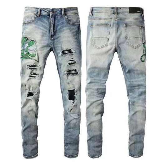 AMIRI COBRA RIPPED JEANS