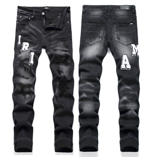 AMIRI BLACK WASHED RIPPED JEANS size 34